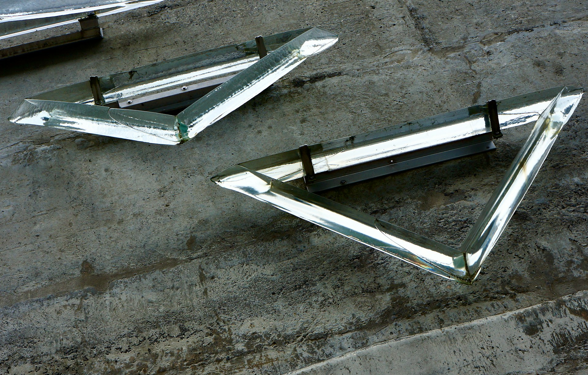 silver ladder on gray concrete floor